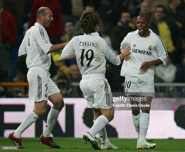 Robinho of Real Madrid celebrates his goal with Antonio Cassano and Zinedine Zidane during a Primera Liga match between Real Madrid and Cadiz at the...