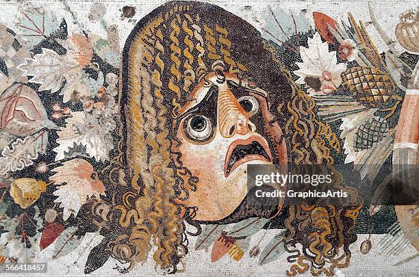 Ancient Roman mosaic of a tragic dramatic mask, from the House of the Faun in Pompeii; first century BC. From the Naples National Archaeological...