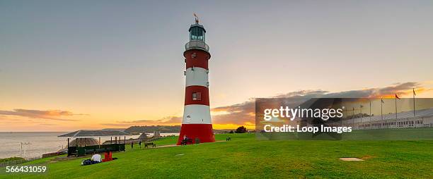 Plymouth Hoe looking south towards the breakwater with Smeaton's Tower in the foreground.