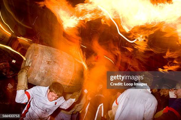 Rolling of the tar barrels in Ottery St Mary in Devon.
