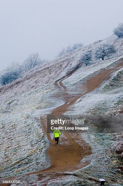 Man jogging in the Malvern Hills.