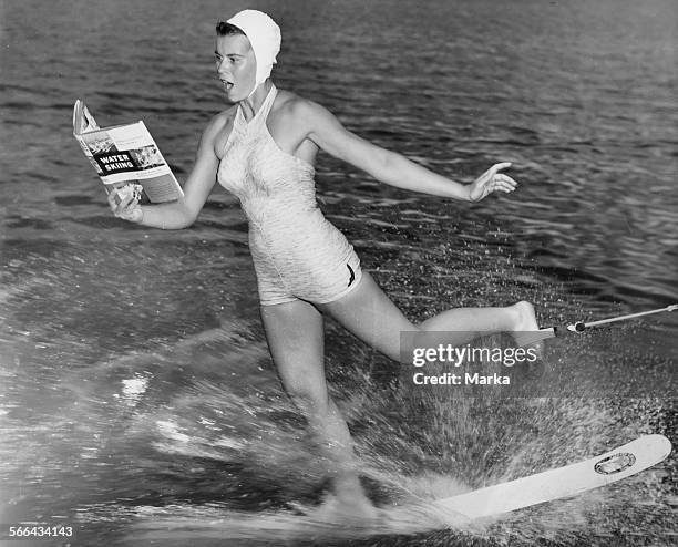 Waterskiing And Reading. 1960.