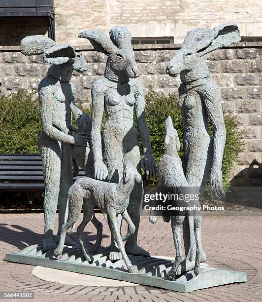 Paint pots sculpture by artist Sophie Ryder in Brewery Court, Cirencester, Gloucestershire, England, UK.