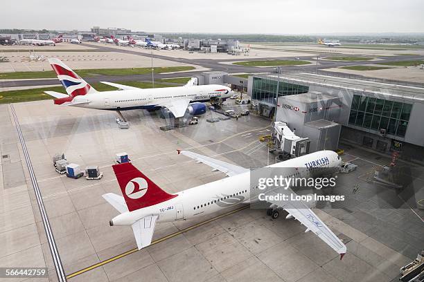 British Airways and Turkish Airways aeroplanes at Gatwick Airport.