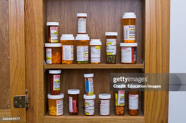 Still life, Medicine cabinet full of prescription pills.