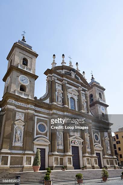 Main facade of Cathedral of San Pietro Apostolo in Frascati with bell towers.