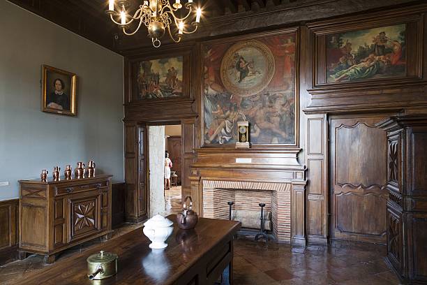 The small salon with typical 17 century furniture inside the Chateau de Monbazillac in France.