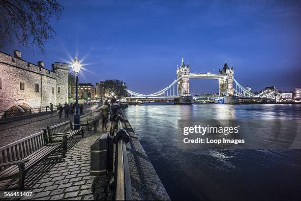 Tower Bridge and The Tower of London at dusk.