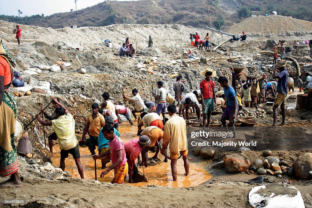 Stone labourers at work on the bank of Dauki River