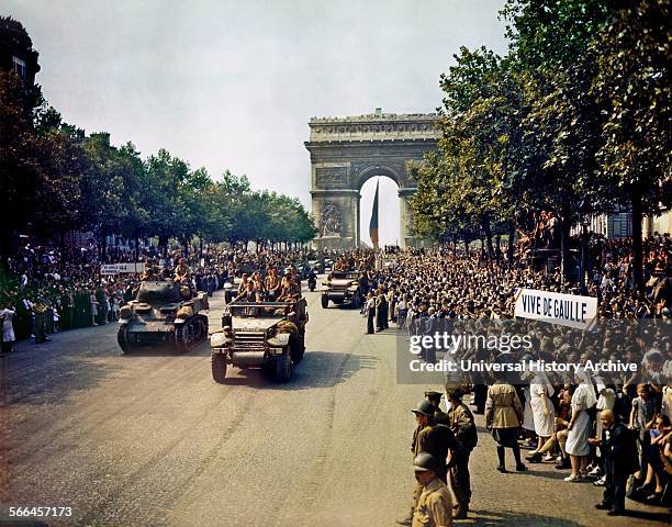 American 2nd Armored Division troops and vehicles parading through the Arc de Triomphe in Paris to celebrate the Liberation of France 1944