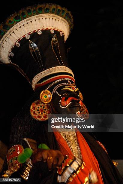 Dancer plays the role of the Demon King Ravana during a performance of Koodiyattam, a classical dance drama from Kerela, India.