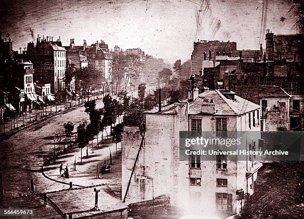 Boulevard du Temple, Paris, France, photographed by Louis Daguerre. Believed to be the earliest photograph showing a living person. Only the two men...
