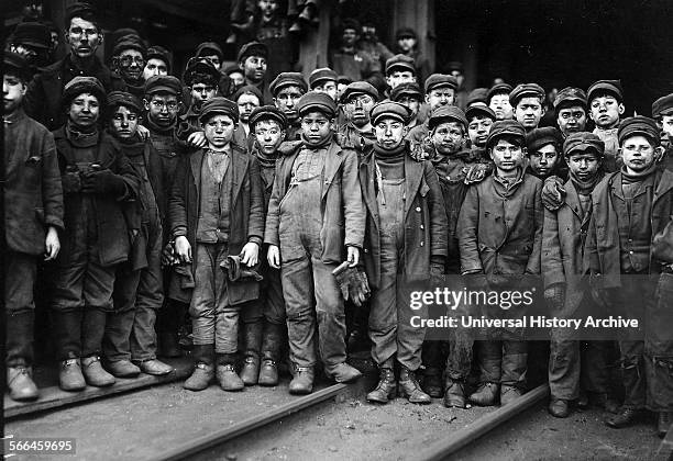 Breaker boys working in Ewen Breaker Coal Mine, South Pittston, Pennsylvania, USA 1910. A breaker boy was a coal-mining worker in the United States...