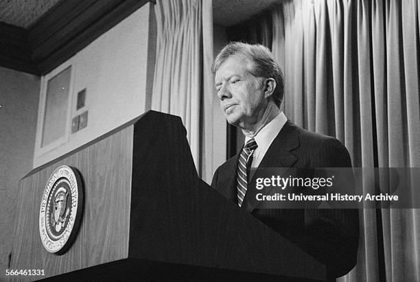 Photograph of President Jimmy Carter announcing new sanctions against Iran following the taking American hostages. Photographed by Marion S....