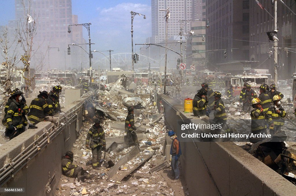 New York Firefighters amid the rubble of the World Trade Centre.