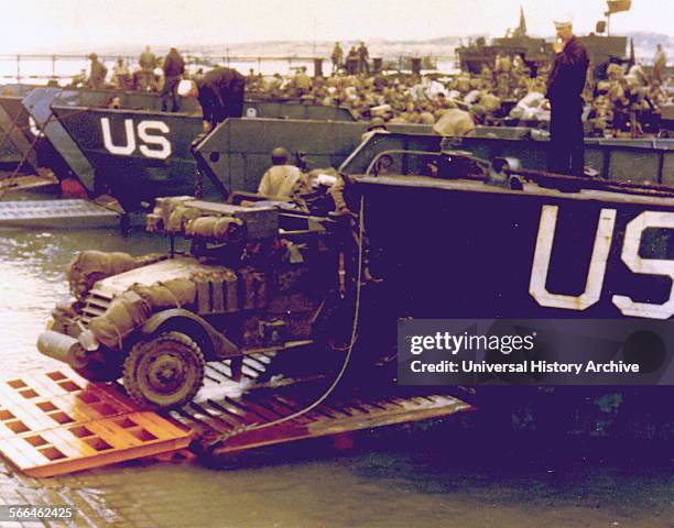 World War Two, Half-track loaded on to a landing craft in a British port during the first days of the Normandy invasion D Day 1944.
