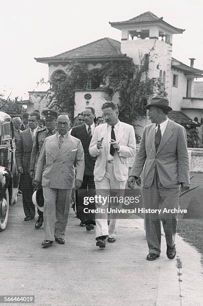 Fred L. Soper American epidemiologist walking with Brazilian President Getulio Vargas, 1940.