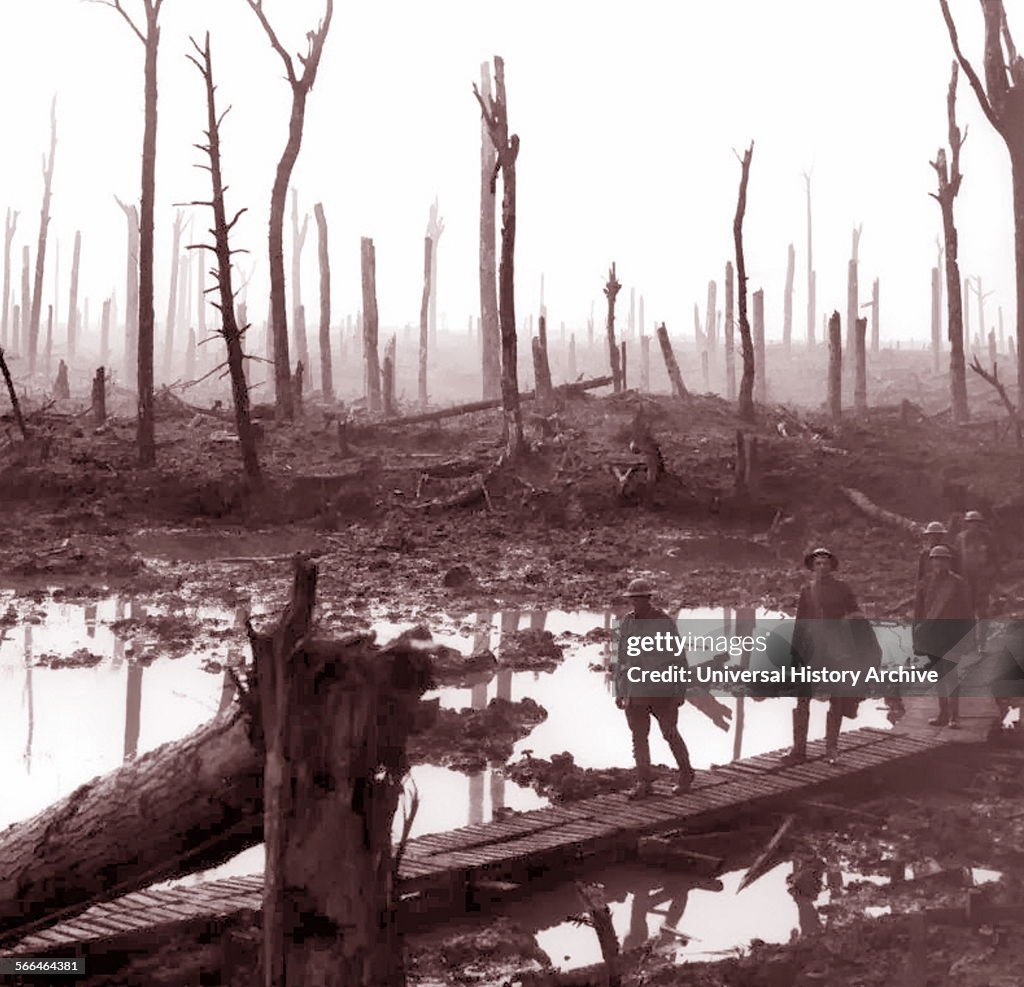 World War One Australian Soldiers passing through mud fields.