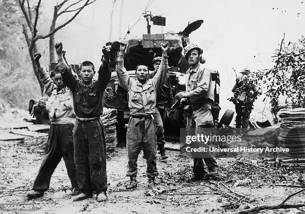 Marine capturing north Korean prisoners of war. Korean War 1953.