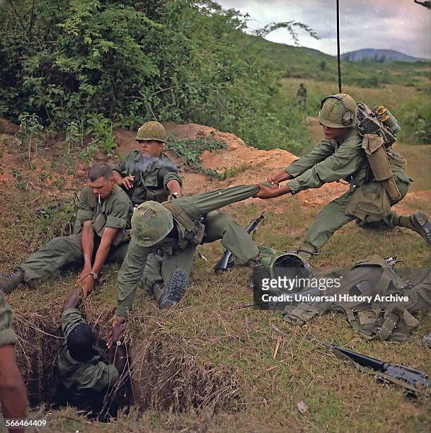 Vietnam War 1968. American soldiers uncover a vietcong tunnel.