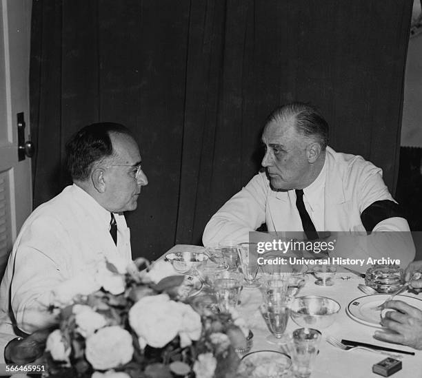 President Getulio Vargas of Brazil confers with President Roosevelt at a conference aboard a U.S.