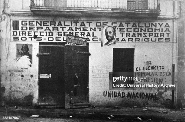 Poster of General Franco is placed on a wall in Barcelona, after nationalist forces enter the city, 1939 during the Spanish Civil War.