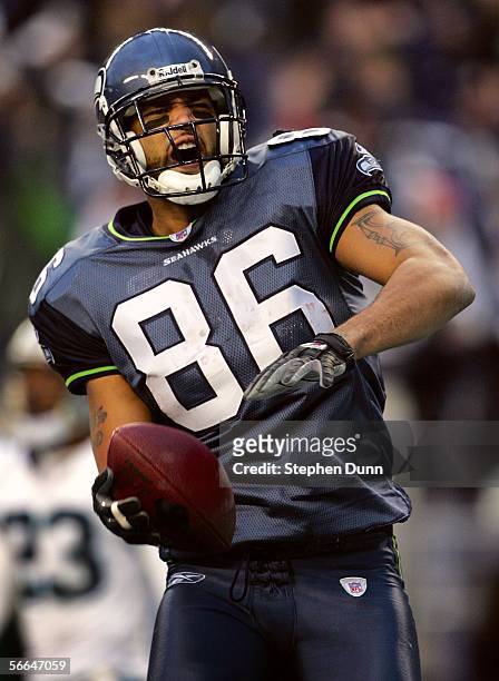 Tight end Jerramy Stevens of the Seattle Seahawks celebrates after scoring the first touchdown during the NFC Championship Game at Qwest Stadium...