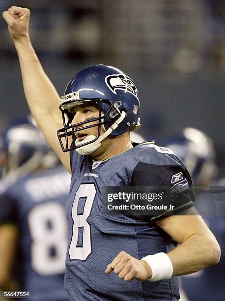 Quarterback Matt Hasselbeck of the Seattle Seahawks celebrates after the team's final touchdown in the fourth quarter of the NFC Championship Game...