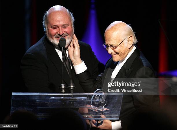 Director Rob Reiner presents Producer Norman Lear the Producers Guild Achievement Award in Television award onstage during the 2006 Producers Guild...