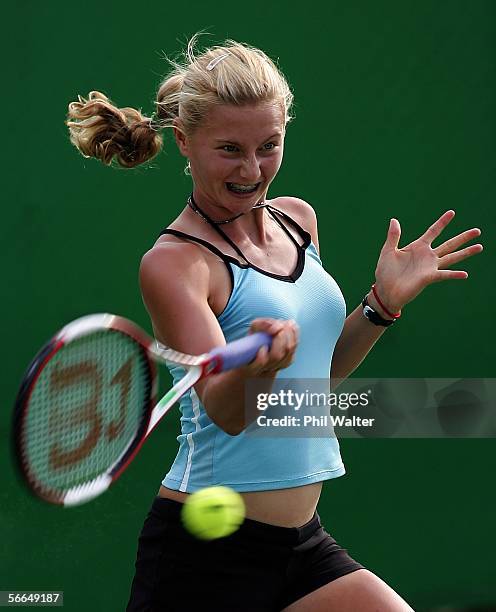 Sacha Jones of New Zealand plays a backhand in her match against Dilyara Saidkhodjayeva of Uzbekistan during the Australian Open Junior Championship...