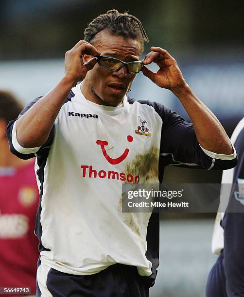 Edgar Davids of Tottenham Hotspur adjusts his glasses during the Barclays Premiership match between Tottenham Hotspur and Aston Villa at White Hart...