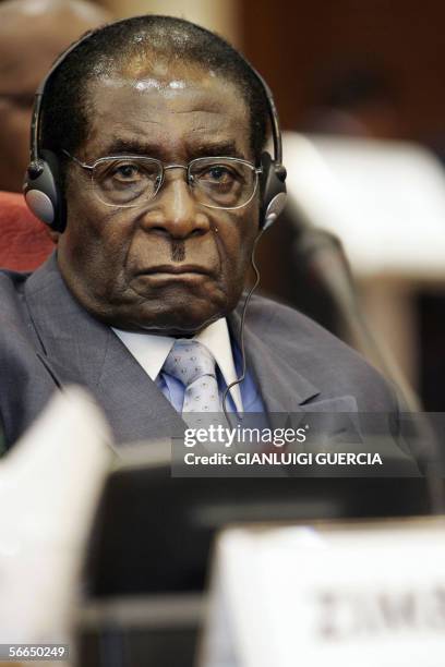 Zimbabwe's President Robert Mugabe attends 23 January 2006 the opening session of the sixth ordinary session of the assembly of the African Union at...