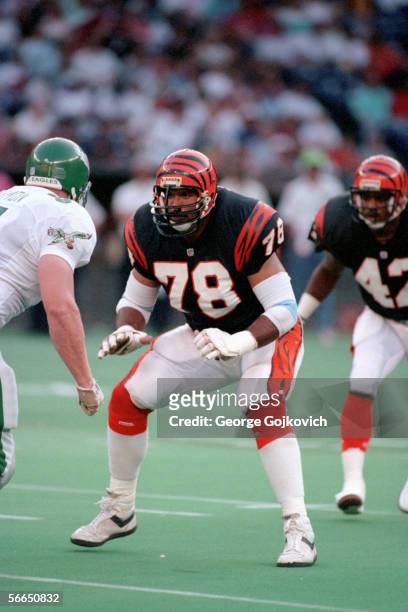 Offensive lineman Anthony Munoz of the Cincinnati Bengals blocks against the Philadelphia Eagles during a preseason game at Riverfront Stadium on...