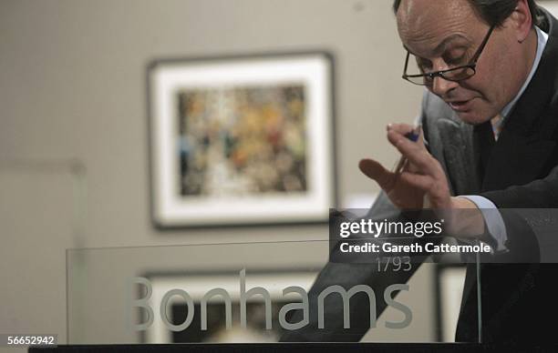 Auctioneer George Cherrytree is seen at the Love At First Sight auction at Bonhams on January 23, 2006 in London, England. The event, hosted by...