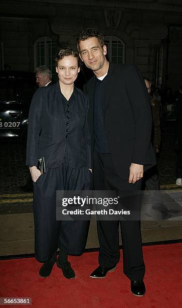 Clive Owne with his wife arrive at the UK Premiere of "Derailed" at the Curzon Mayfair on January 23, 2006 in London, England.