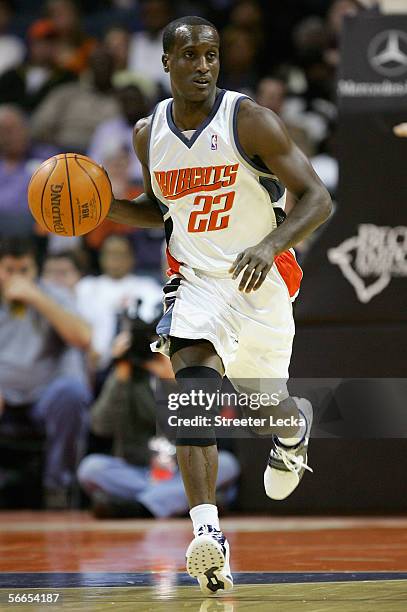 Brevin Knight of the Charlotte Bobcats brings the ball upcourt during the game against the Toronto Raptors on December 10, 2005 at the Charlotte...