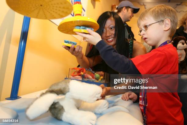 Minnesota Timberwolves Dance Team Member Shayna makes stuffed animals with pediatric cancer patients and their families from St. Paul and Minneapolis...