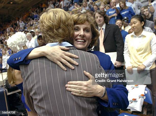 Coach Pat Summitt of the Tennessee Volunteers hugs coach Gail Goestenkors of the Duke Blue Devils before their game on January 23, 2006 at Cameron...