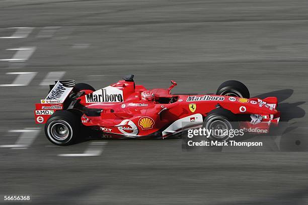 Michael Schumacher of Germany drives the new Ferrari 248 F1 during the launch of the new Ferrari F1 car for the Season 2006 on January 24, 2006 in...