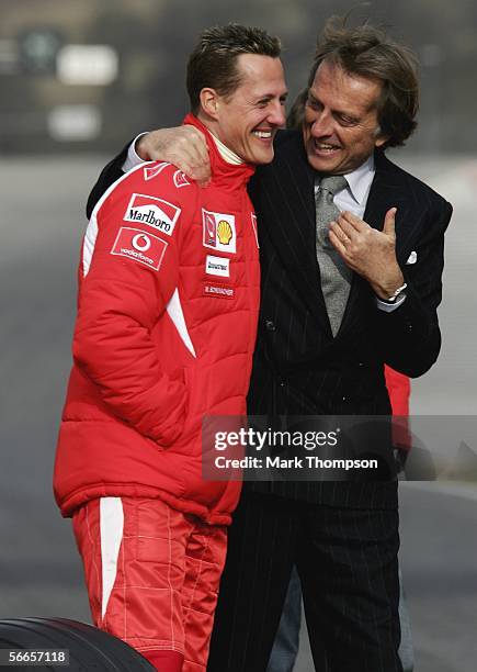 Ferrari president Luca di Montezemolo and Michael Schumacher of Germany talk during the launch of the new Ferrari F1 car for the Season 2006 on...