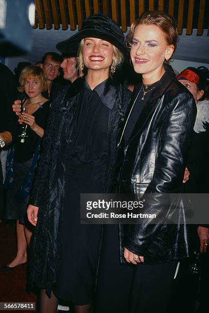 American fashion model, Amber Valletta and American comedian, Sandra Bernhard attend the 'Visionaire' magazine party, New York City, circa 1998.
