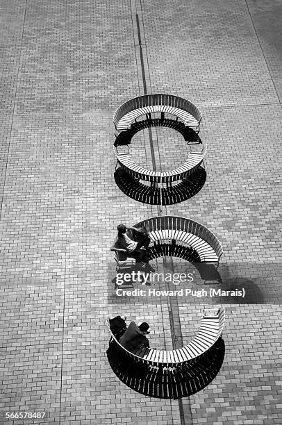 incomplete circle of park benches - barbican stock pictures, royalty-free photos & images