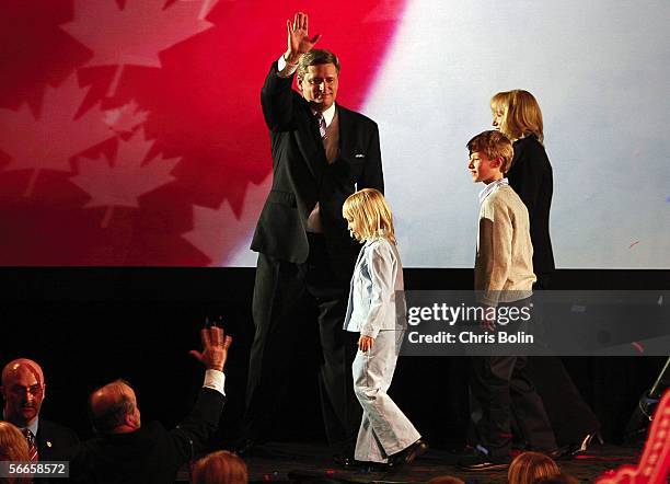 Newly elected Canadian Prime Minister Stephen Harper , leader of the Conservative Party, waves to supporters as he celebrates his win with his wife,...