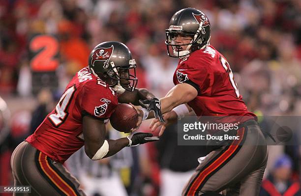 Running back Carnell Williams of the Tampa Bay Buccaneers gets the ball from quarterback Chris Simms against the Washington Redskins during the NFC...