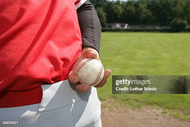 close-up of a baseball pitcher holding a baseball - baseball pitcher close up stock pictures, royalty-free photos & images