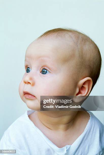 portrait of a baby with blue eyes - blue eyes stock pictures, royalty-free photos & images