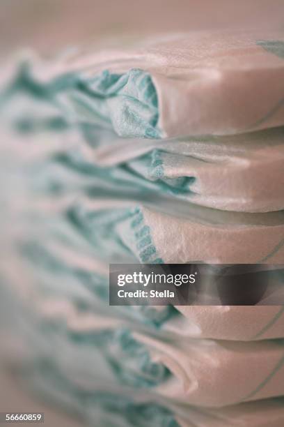a stack of diapers - diapers stack stock pictures, royalty-free photos & images