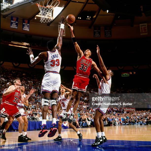 Scottie Pippen of the Chicago Bulls shoots against Patrick Ewing of the New York Knicks during Game 5 of the Eastern Conference Finals June 2, 1993...