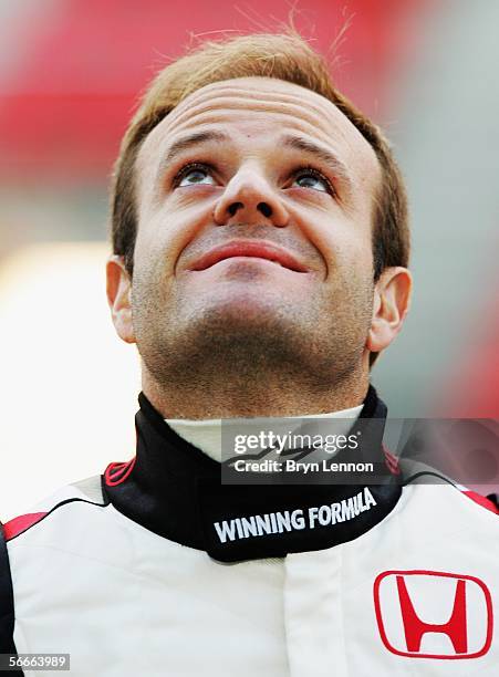 Honda driver Rubens Barrichello of Brazil poses during a photocall for the new Honda RA106 F1 car at the Circuito de Catalunya on January 25 in...