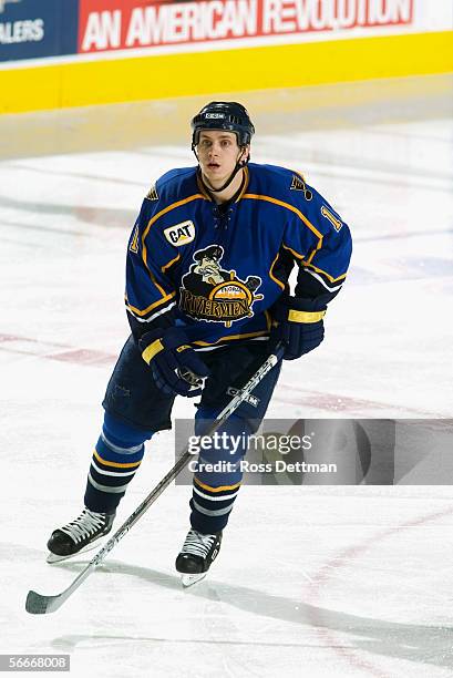 Jon DiSalvatore of the Peoria Rivermen skates against the Chicago Wolves at Allstate Arena on December 11, 2005 in Rosemont, Illinois. The Wolves won...